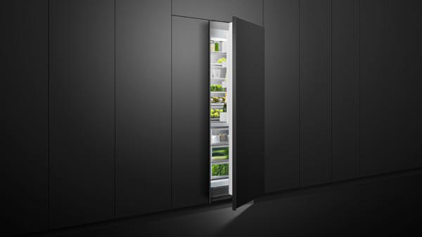 Open Ingerated Refrigerator Set in Black Cabinetry.